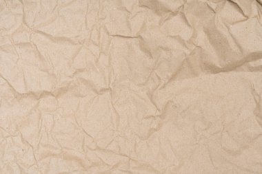 crumpled brown paper texture or background