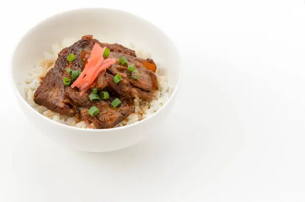 stock image Japanes food, Sokidon (Simmered spareribs).Simmered seasoned pork spare ribs on rice.