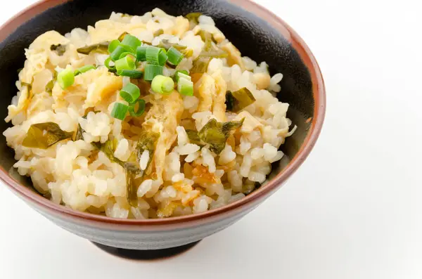 stock image Japanese cuisine, Takikomi gohan with fried tofu and wakame, on white background 