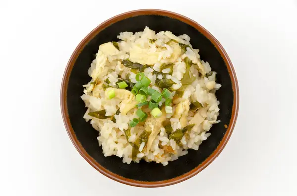 stock image Japanese cuisine, Takikomi gohan with fried tofu and wakame, on white background 