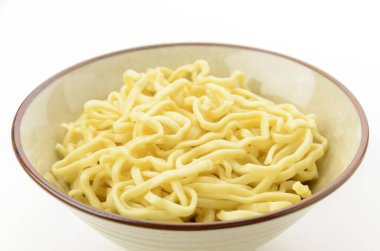 Okinawa soba noodles in a bowl on a white background. clipart