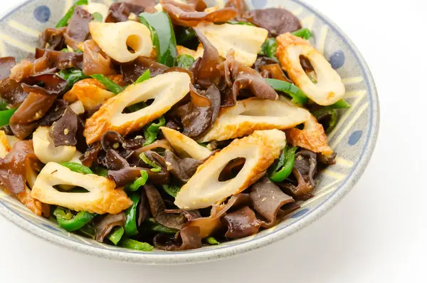 stock image Stir-fried Jew's ear mushroom and chikuwa on Plate on white background