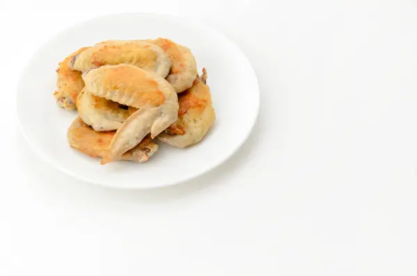 stock image Salt-grilled chicken wings on white plate