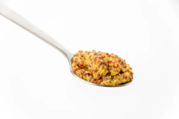 stock image Teaspoon of whole grain mustard on white background