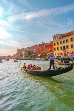 Venice, Italy  September 27, 2019 Panoramic view over busy Grand Canal with many boats, near beautiful Basilica di Santa Maria della Salute and the historical center clipart