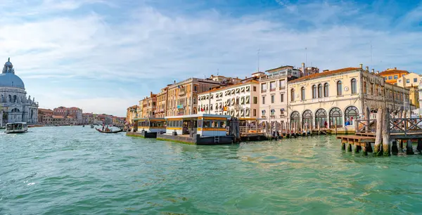 stock image Venice, Italy  September 27, 2019 Panoramic view over busy Grand Canal with many boats, near beautiful Basilica di Santa Maria della Salute and the historical center