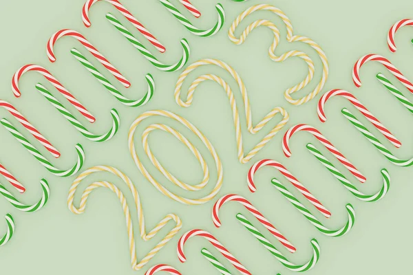 Barevné Tyčinky Mátově Zeleném Pozadí Čísly2023 Dovolená Vykreslení Vánoční Novoroční — Stock fotografie