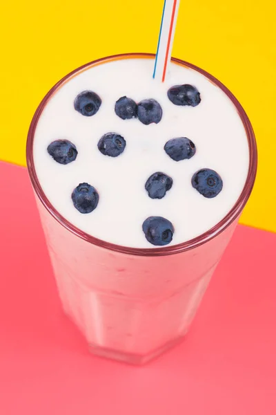 Glass Cold Milkshake Fresh Blueberries Top Drink Glass Straw Yellow — Fotografia de Stock