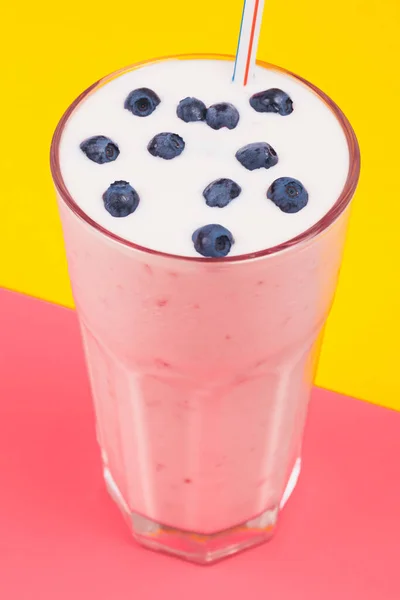 Glass Cold Milkshake Fresh Blueberries Top Drink Glass Straw Yellow – stockfoto