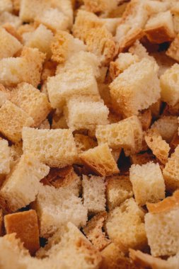 Croutons. Roasted white bread. Close-up of delicious croutons. Macro shot of croutons.