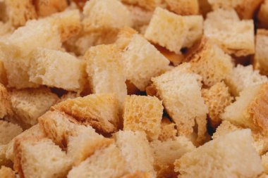 Croutons. Roasted white bread. Close-up of delicious croutons. Macro shot of croutons.