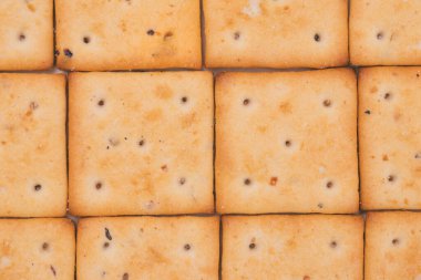 Lezzetli kareli krakerler, yakından. Makro çekim.