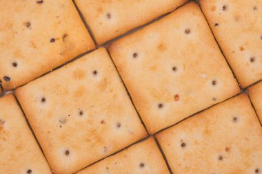 Lezzetli kareli krakerler, yakından. Makro çekim.