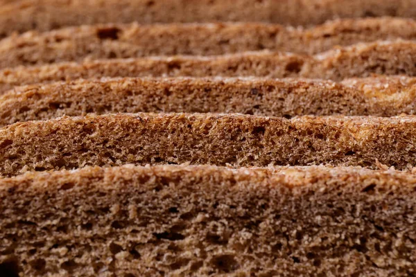 Nakrájený Hnědý Chléb Pokrytý Otrubami Makro Snímek — Stock fotografie