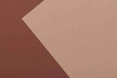 Kahverenginin farklı tonlarından oluşan bir kağıdın çok renkli arkaplanı. Geometrik arkaplan.
