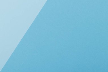 Mavinin farklı tonlarından oluşan bir kağıdın çok renkli arkaplanı. Geometrik arkaplan.