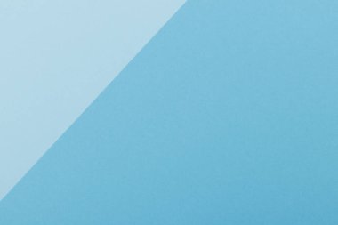 Mavinin farklı tonlarından oluşan bir kağıdın çok renkli arkaplanı. Geometrik arkaplan.