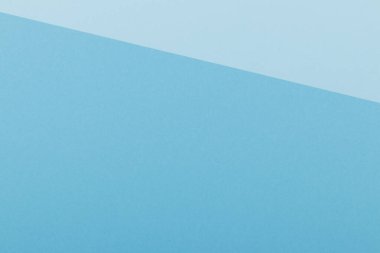 Mavinin farklı tonlarından oluşan bir kağıdın çok renkli arkaplanı. Geometrik arkaplan.