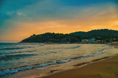 Beautiful sunset on the beach in Scauri, Italy.