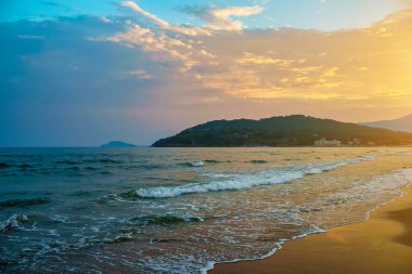Beautiful sunset on the beach in Scauri, Italy.