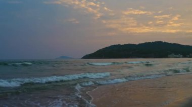 Sunset on the beach in Scauri, Italy.