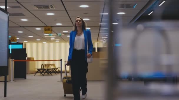 Woman Suitcase Walking Airport Terminal — ストック動画