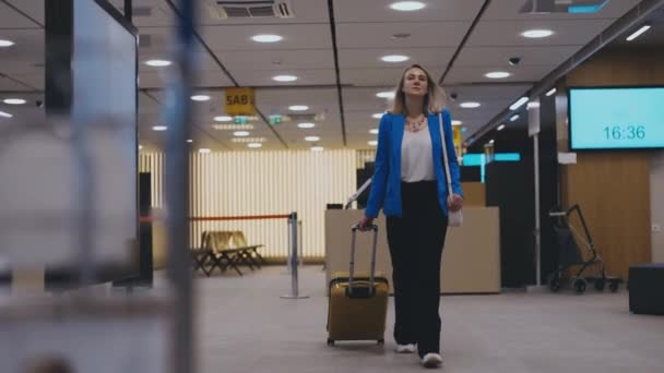 Woman Suitcase Walking Airport Terminal — ストック動画