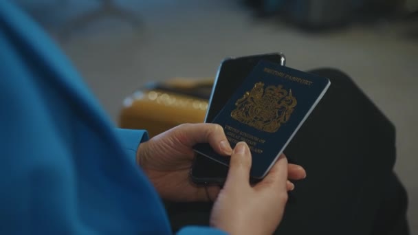 Woman British Passport Waiting Her Flight Airport — Αρχείο Βίντεο