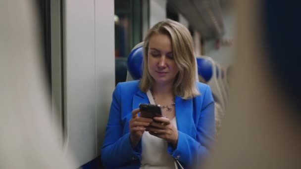 Woman Business Suit Phone Travelling Train — 图库视频影像