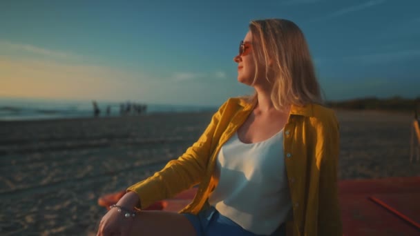 Woman Sits Boat Looks Sea Sunset — Stockvideo