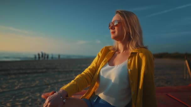 Woman Sits Boat Looks Sea Sunset — Stockvideo