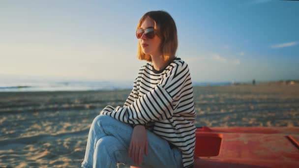 Teenage Girl Sits Sea Sunset — Video Stock