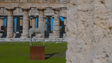 Horse Statue and Second Temple of Hera in Paestum, Italy.