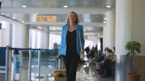 Woman Suitcase Walking Airport Terminal — Stockvideo