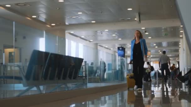 Woman Suitcase Walking Airport Terminal — Stockvideo