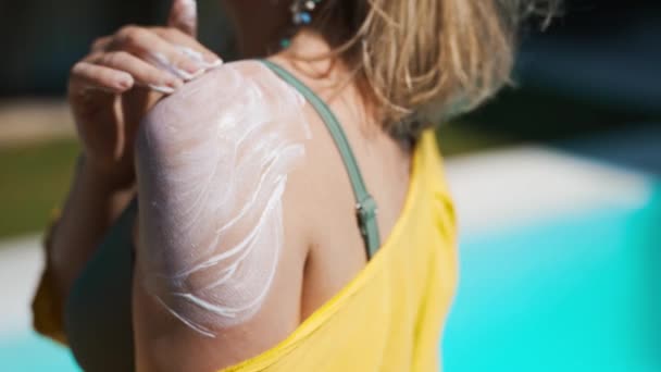 Woman Applying Sunblock Cream Her Shoulder — Stock Video