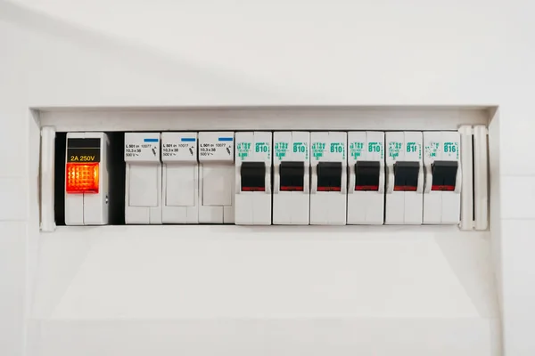 Close-up view of switches on fuse board.