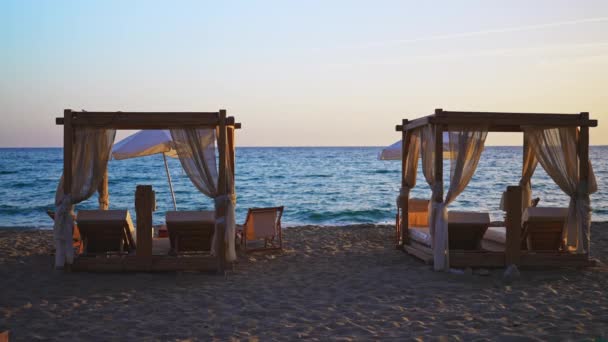 Beach Cabana Beds Sun Loungers Seashore Sunset Stock Footage