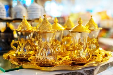 Side, Turkey - 08.06.2024: Altın çay ya da kahve kupası. Editör kullanımı.