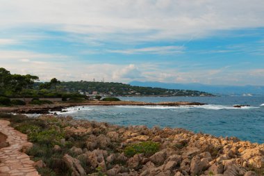 Popular hiking trail in the south of France on Cap d'Antibes. clipart