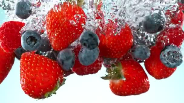 Super Slow Motion Falling Berries Underwater Filmed High Speed Cinema — Stock Video