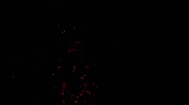 Kara Arkaplanda Kıvılcımlar Olan Çok Yavaş Ateş Hareketi. Yüksek Hız Sinema Kamerası, 1000 fp..