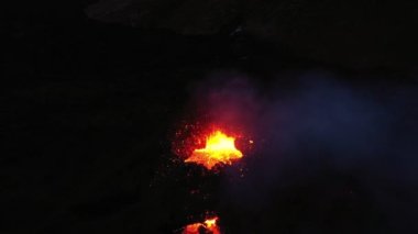 Aerial panoramic footage of Meradalir volcano eruption. Iceland 20.8.2022. Drone footage, lava is exploding and spreading out of crater.