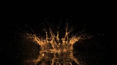 Siyah arka planda izole edilmiş altın sıvının çok yavaş sıçraması. Yüksek hızlı sinema kamerası, 1000 fps..