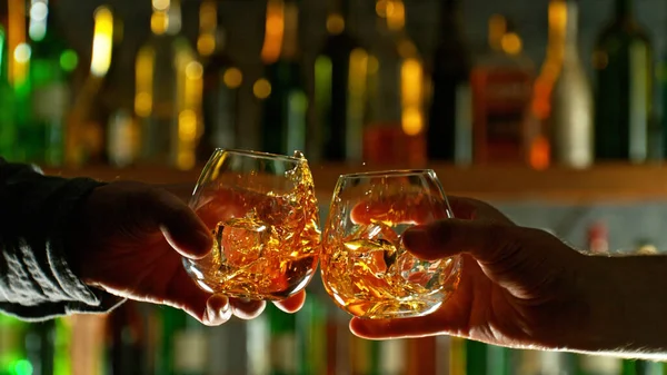 Close View Two Whiskey Shots Hands Glasses Clinking Bar Pub — Stock Photo, Image