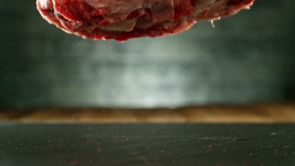 Flying Piece Raw Beef Steak Falling Table Camera Fast Motion — Stock Video