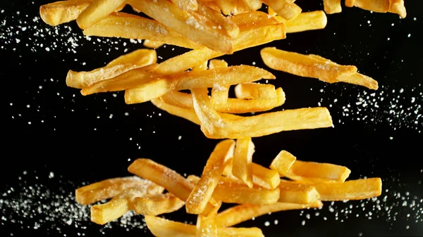 French Fries Fried Potatoes Flying Fly Fastfood Isolated Black Background — Stock Photo, Image