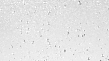 Super slow motion of bubbling boiling water in detail. Filmed on high speed cinema camera, 1000 fps.
