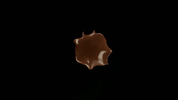 Super Cámara Lenta Salpicadura Chocolate Caliente Sobre Fondo Negro Filmado — Vídeo de stock