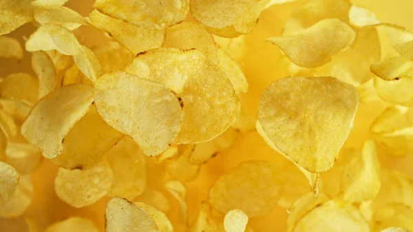 Batatas Fritas Voando Vôo Junk Food Isolado Fundo Amarelo — Fotografia de Stock